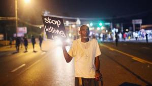 A protestor in Ferguson.  (CBS News photo)