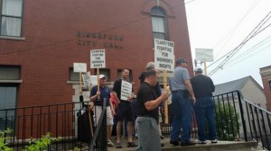 Union members protest outside City Hall before the July 7 meeting. (Biddeford Teamsters photo)
